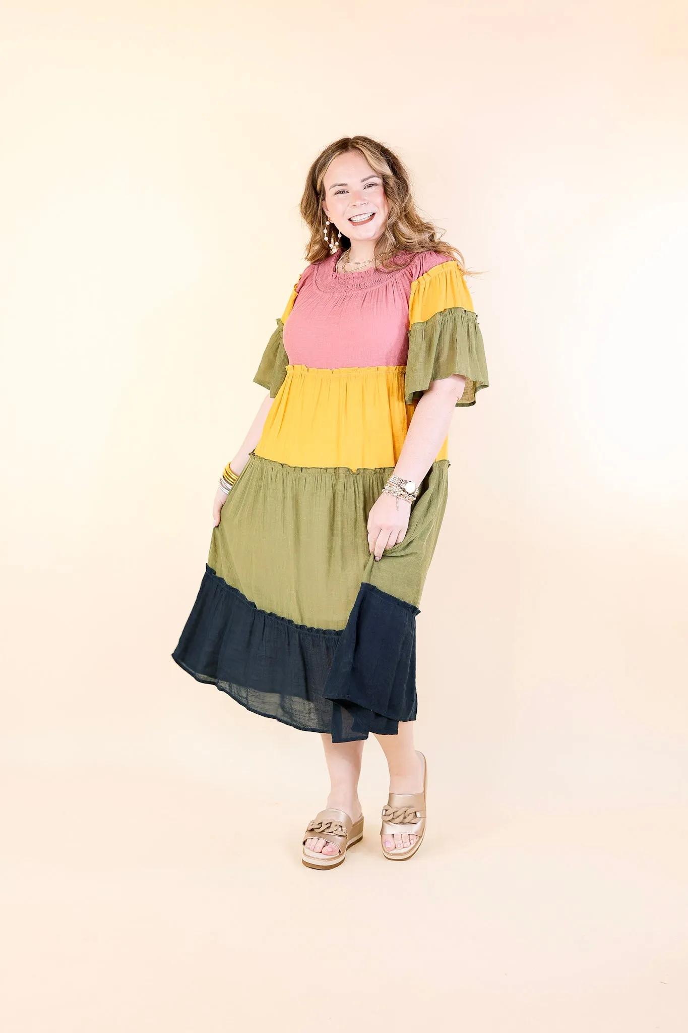 In the Villa Color Block Off the Shoulder Midi Dress in Mustard, Olive, Mauve, and Navy