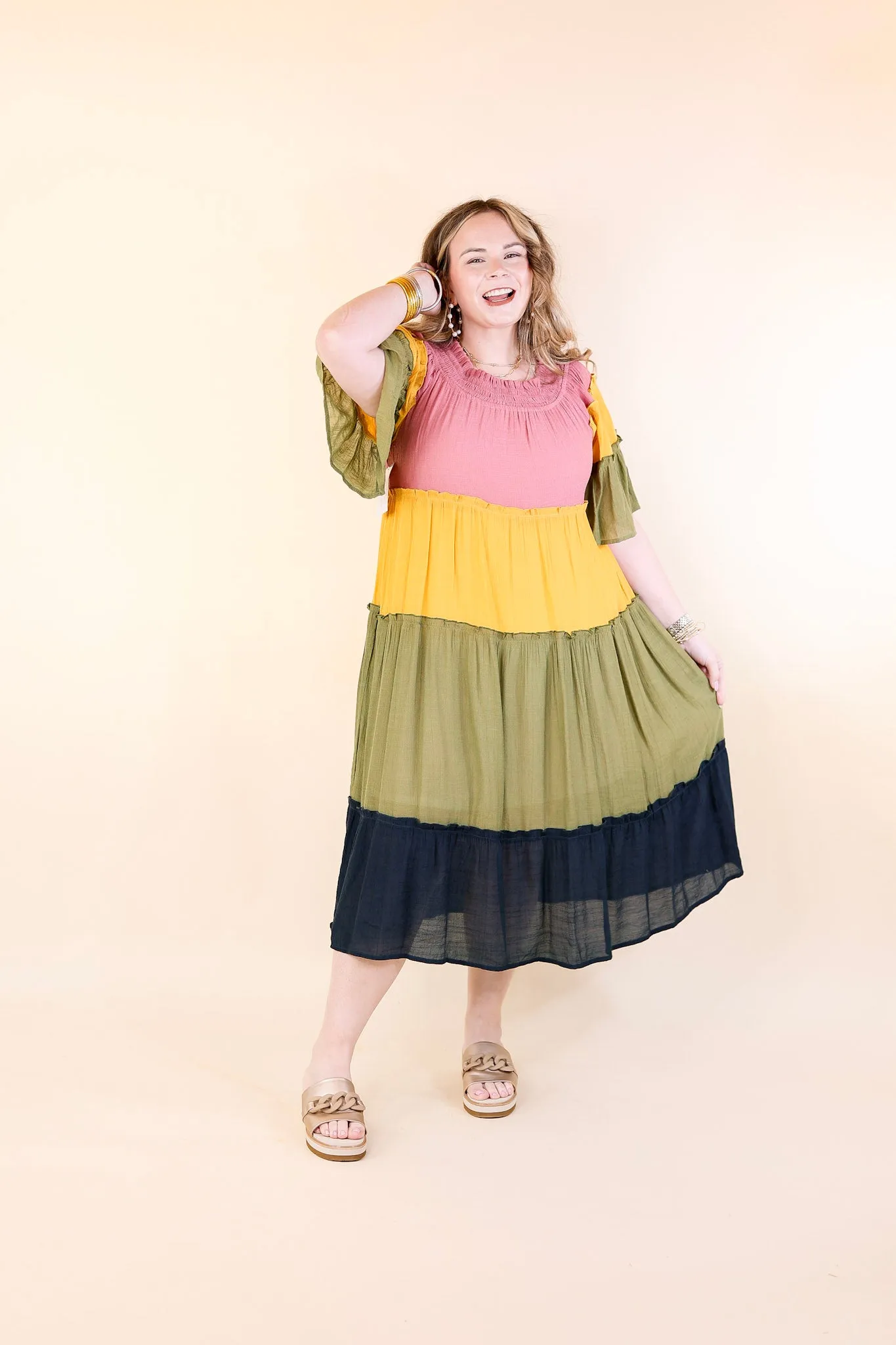 In the Villa Color Block Off the Shoulder Midi Dress in Mustard, Olive, Mauve, and Navy