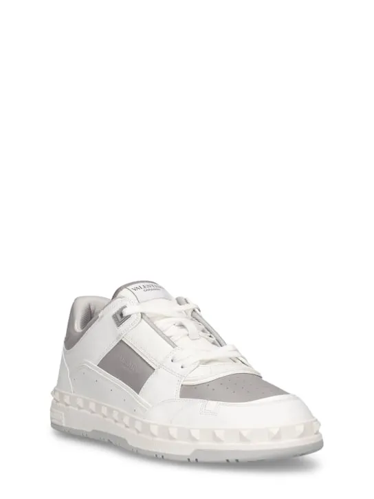 Valentino Garavani   Freedots leather low top sneakers 